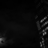 Tuesday, March 3rd, 2015 in Frankfurt - Number 063 of 366mm
Mysterious converging lines of a skyscraper in the moonlight